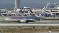 N837NN @ KLAX - Thrust reversers and spoilers deployed