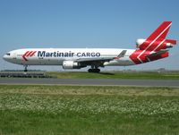 PH-MCR @ LFPG - c/n 581, delivered in 1995 as a MD-11CF. Charlie-Romeo was heading to runway 09R in anticipation of a positionin flight to AMS after spending a week serving AF Cargo