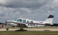 N707LJ @ KOSH - Beech A36TC - by Mark Pasqualino