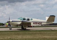 N354DG @ KOSH - Beech J35