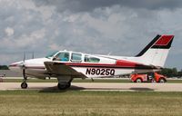 N9025Q @ KOSH - Beech B55 - by Mark Pasqualino