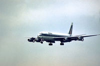 I-DIWG @ LHR - DC-8-43 of Alitalia on final approach to Runway 10L at Heathrow in April 1975. - by Peter Nicholson