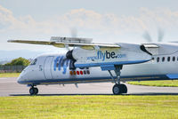 G-ECOG @ EGGP - On hold on taxiway prior to take off on runway 27. - by Mark J Kopczewski