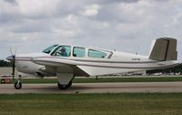 N277RB @ KOSH - Beech S35