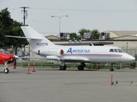 N232TW @ ONT - Engines covered and parked on the southside - by Helicopterfriend