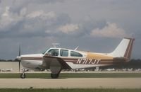 N717JT @ KOSH - Beech C33 - by Mark Pasqualino