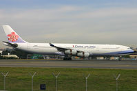 B-18802 @ YSSY - slowing to taxi to terminal - by Bill Mallinson