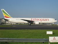 ET-ALJ @ LFPG - A once-in-a-blue-moon occurence took place on 07/30. Normally, ET lands on Saturdays mornings and the 763 is towed to the freight ramp for the ROD. This time, the aircraft was towed to and spent the ROD on Sierra remote ramps opposite Terminal 1 - by Alain Durand