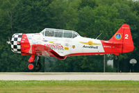 N3267G @ OSH - 1943 North American SNJ-5, c/n: 51971 - AEROSHELL 2 - landing at Oshkosh 2011 - by Terry Fletcher