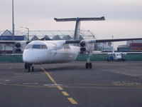 ZK-NET @ NZAA - Turning onto stand at Auckland - by magnaman