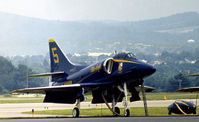 154975 @ RDG - A-4F Skyhawk Blue Angels number 5 on the flight-line at the 1976 Reading Airshow. - by Peter Nicholson