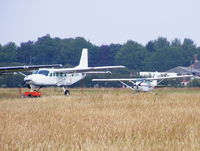 G-PLEE @ X4PE - alongside N208AD at the Peterlee Parachute Centre based at Shotton airfield. - by Chris Hall