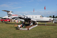 N265NX @ OSH - Pilatus Aircraft Ltd PC-12/47E, c/n: 1265 - static display at 2011 Oshkosh - by Terry Fletcher