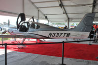 N337TM @ OSH - Cirrus Design Corp SR22T, c/n: 0160 on Static Display at 2011 Oshkosh - by Terry Fletcher