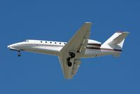 N381QS @ YVR - Landing on a bright, sunny day .