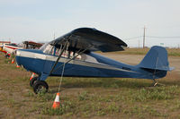 N3183E @ 94Z - A 1946 Aeronca survives the weather of Nome - by Duncan Kirk