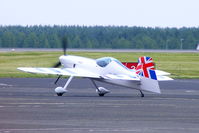 D-EYXA @ EGNT - Red Bull Matadors ExtremeAir Sbach 300 taxiing out for its display at the Sunderland Airshow - by Chris Hall