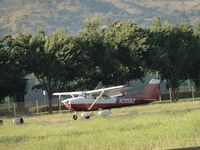 N20562 @ POC - Touching down on runway 26R - by Helicopterfriend