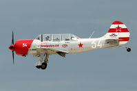 N252TW @ OSH - 2002 S C Aerostar S A YAK-52TW, c/n: 0212301 - WHITE 34 - at 2011 Oshkosh - by Terry Fletcher