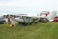 N19EZ @ OSH - 1970 Cessna T337E, c/n: 33701315 - setting up for Static Display at 2011 Oshkosh - by Terry Fletcher