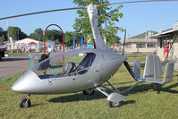 N446LC @ OSH - Galen Geigley CALIDUS, c/n: 10074 - static display at 2011 Oshkosh - by Terry Fletcher