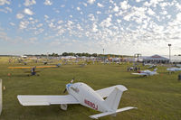 N1690J @ KOSH - Parked along the flight line at Oshkosh. - by rocapps