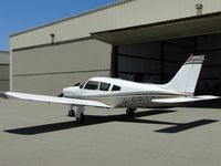 N15909 @ CNO - Parked near a hanger - by Helicopterfriend