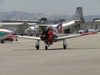 N9671N @ CNO - Taxiing to runway with passenger - by Helicopterfriend