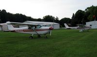 N6805E @ I61 - 1960 model 175A 6805E on the grass with a 1968 C172.
The 175 has a Lycoming O-320 160HP engine with a Hartzell constant speed prop. - by Self