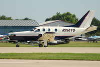 N218TG @ OSH - Socata TBM 700, c/n: 487 at 2011 Oshkosh - by Terry Fletcher