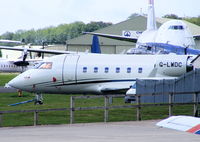 G-LWDC @ EGBP - although partially hidden by the building, this Challenger is now sporting a new paint job - by Chris Hall