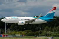 LX-LGS @ ELLX - on final RW24 - by Friedrich Becker