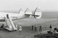N90817 @ SFO - My family (I'm behind my mother) leaving San Francisco and returning to Detroit in November 1956. - by Ted Fries