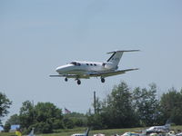 M-USTG @ KOSH - landing @ KOSH during EAA 2011