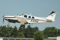 N3191A @ OSH - 1999 Raytheon Aircraft Company A36, c/n: E-3291 at 2011 Oshkosh - by Terry Fletcher