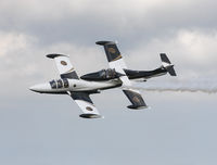 N763JS @ KNTU - Snort & Jive close pass in tight formation. - by Gregg Stansbery