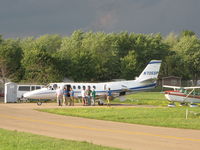 N705SP @ KOSH - Basking in the evening sun at EAA2011 - by steveowen