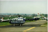 G-BNPS @ EGKA - The 1st helicopter operated by Sussex Police from Shoreham (scanned print) - by Andy Parsons