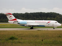 OE-LFK @ LSGG - Taxiing holding point rwy 23 for departure... - by Shunn311