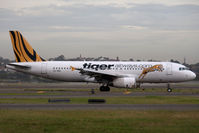 VH-VNO @ YSSY - catch this tiger by the tail - by Bill Mallinson