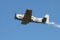 N28XT @ KOSH - Performing at Airventure 2011. - by Bob Simmermon