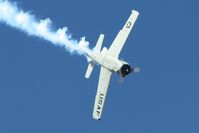N28XT @ KOSH - Performing at Airventure 2011. - by Bob Simmermon
