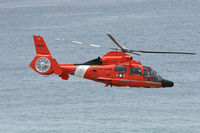 6551 @ KPNS - 6651 makes a pass down the beach to clear the water for the beach show. - by Gregg Stansbery