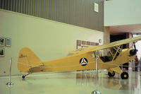 42-36446 @ FFO - L-4A Grasshopper in Civil Air Patrol markings as NC42050 as seen at the USAF Museum in the Summer of 1977. - by Peter Nicholson