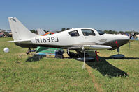 N169PJ @ OSH - 2005 Lancair Company LC41-550FG, c/n: 41065 at 2011 Oshkosh - by Terry Fletcher