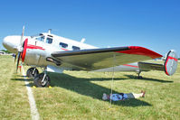 N127ML @ OSH - 1946 Beech D18S, c/n: A-212 at 2011 Oshkosh - by Terry Fletcher