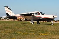 N65KF @ KOSH - Departing Airventure 2011. - by Bob Simmermon