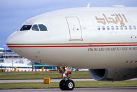 A6-EYF @ EGCC - Etihad Airways - by Chris Hall