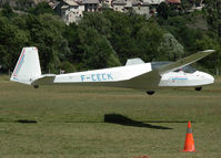 F-CECK @ LFNC - Just airborne, towed by a cable, about to start a very steep climb. Old village of St Crépin visible on the background. - by Philippe Bleus