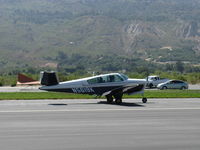 N5619K @ SZP - 1964 Beech S35 BONANZA, Continental IO-520-B 285 Hp, landing roll Rwy 22 - by Doug Robertson